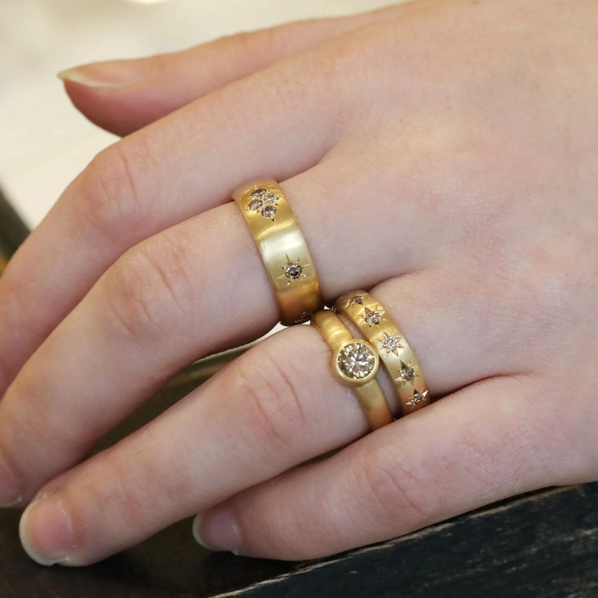 20K Gold Slightly Rounded Ring with 13 Star-Set Cognac Diamonds