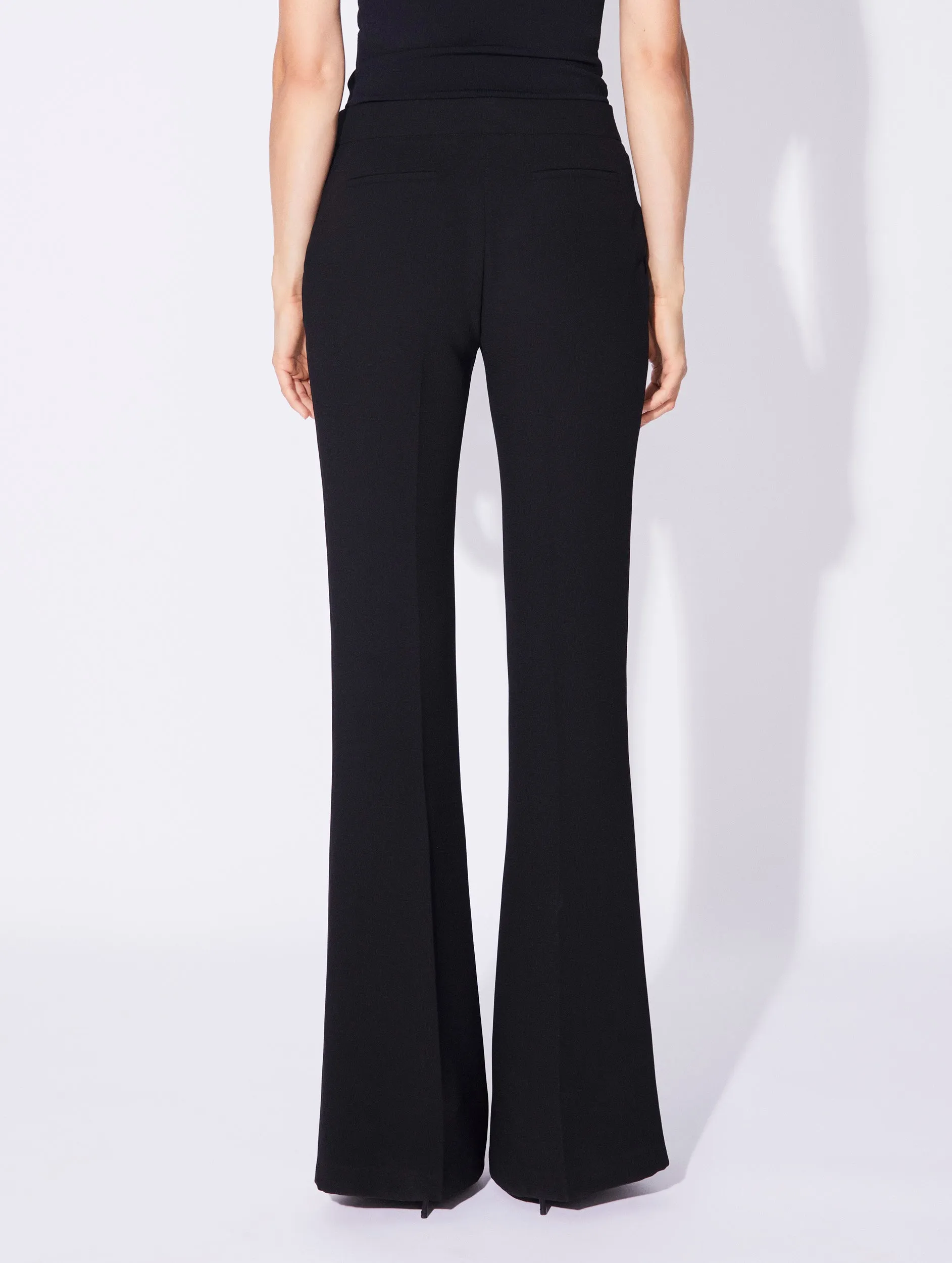 Black crepe flared trousers with buckle detail