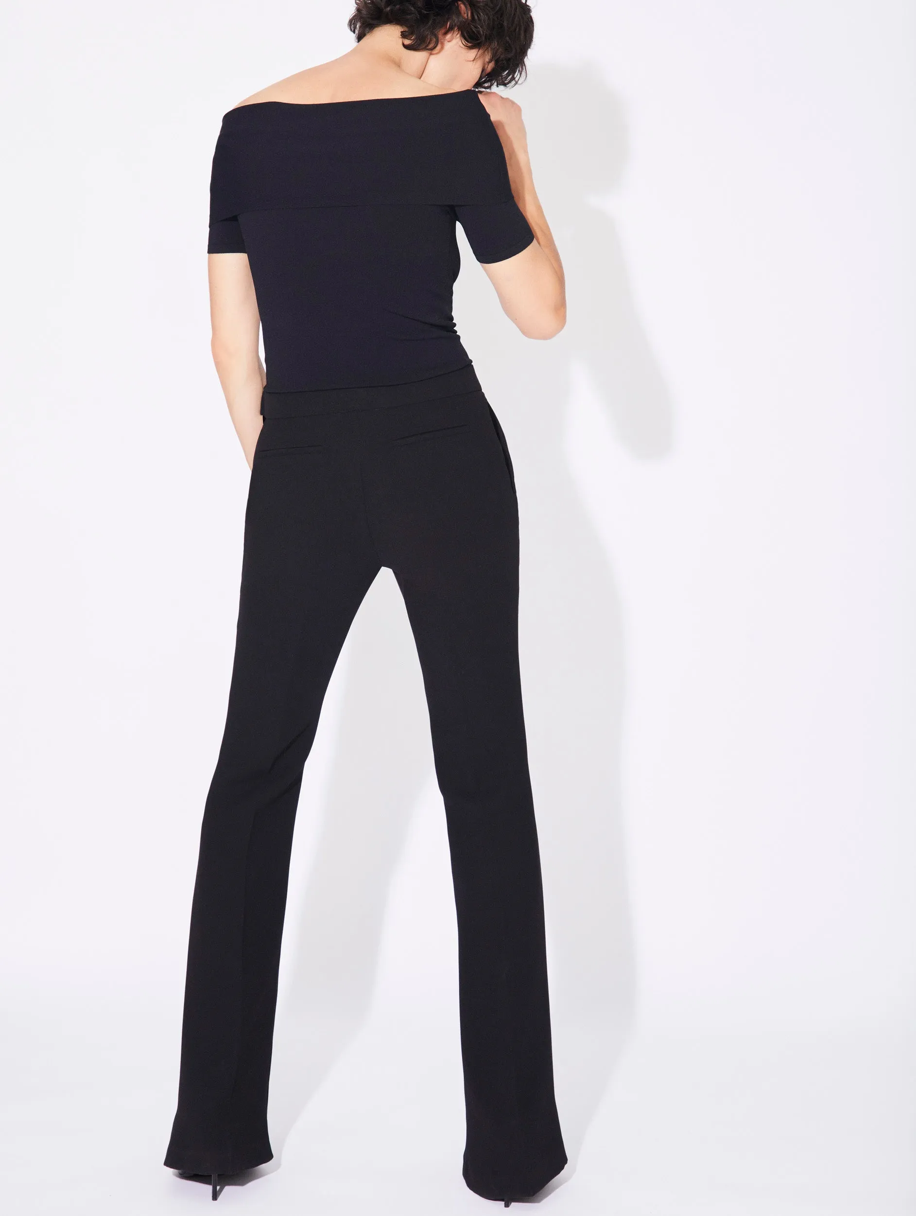 Black crepe flared trousers with buckle detail