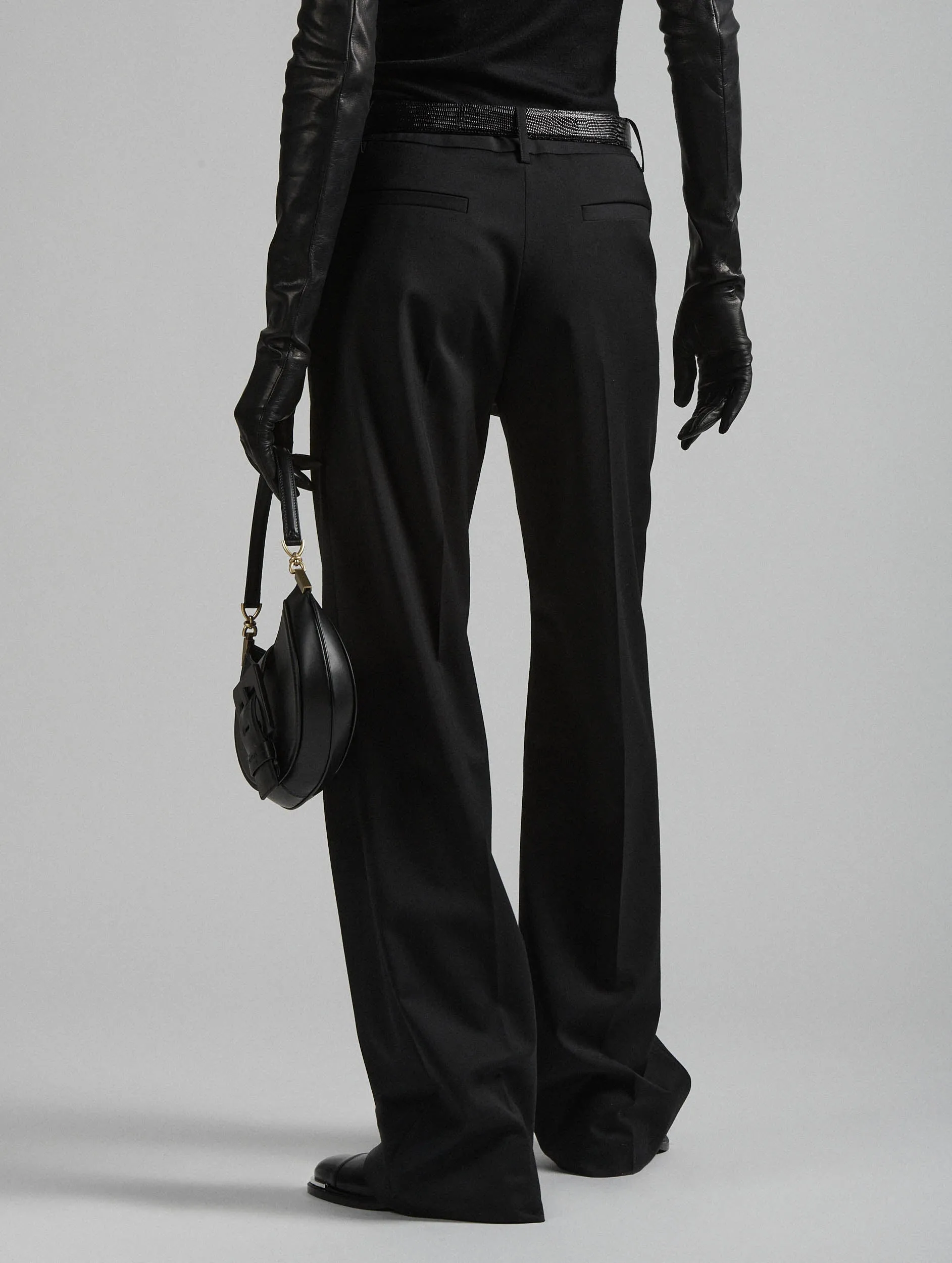 Black wool gabardine low-waist trousers