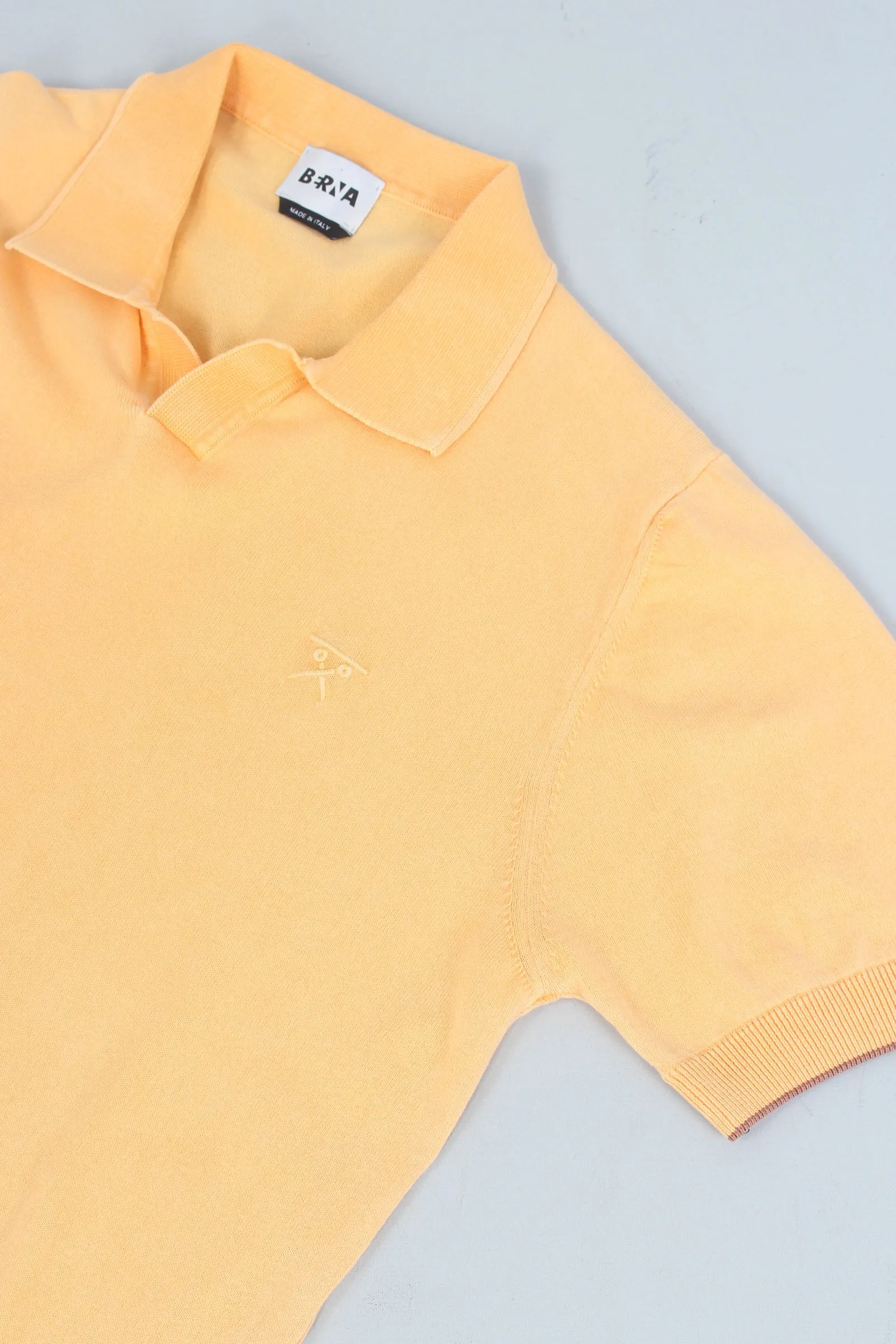 Stone Tangerine Buttonless Polo